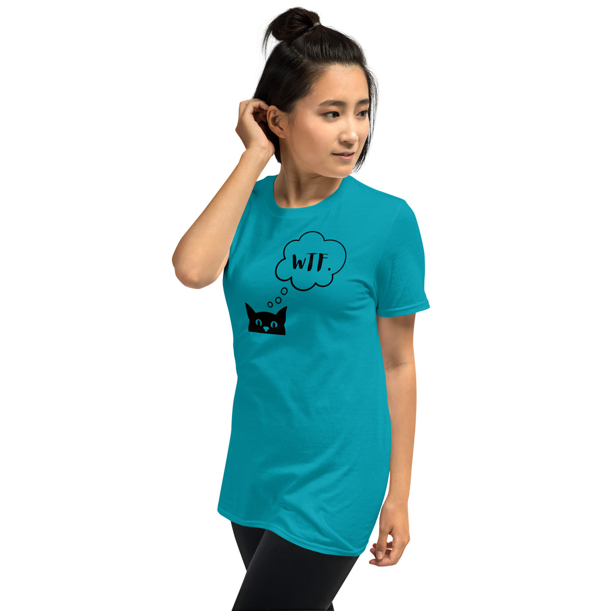 Model wearing left front facing graphic T-shirt in color tropical blue, featuring printed image of cat with thought bubble, and the initialism 'WTF', inside the bubble in black print. From What Was Said (Statement Apparel + More). 
