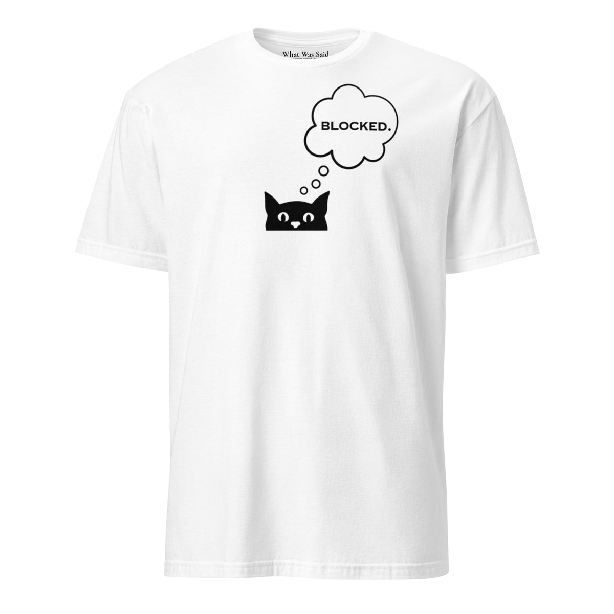 Front facing graphic T-shirt in color white, featuring printed image of cat with thought bubble, and the written  word 'BLOCKED', inside the bubble in black print. From What Was Said (Statement Apparel + More). 