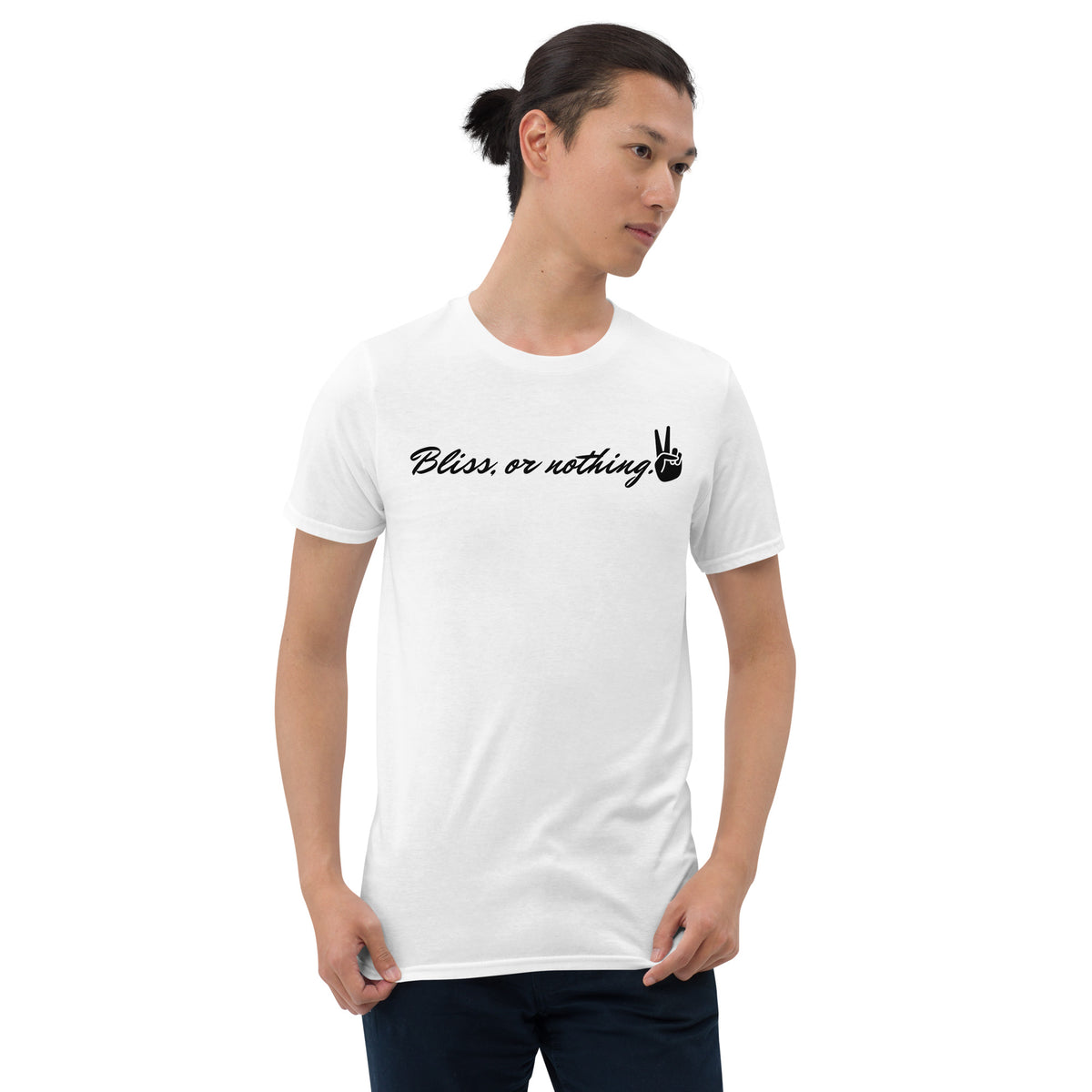 Model is wearing front facing graphic t-shirt in color white, featuring statement, 'Bliss, or nothing,' in bold black cursive print. With a hand showing the peace sign at the end of the statement. From What Was Said (Statement Apparel + More).