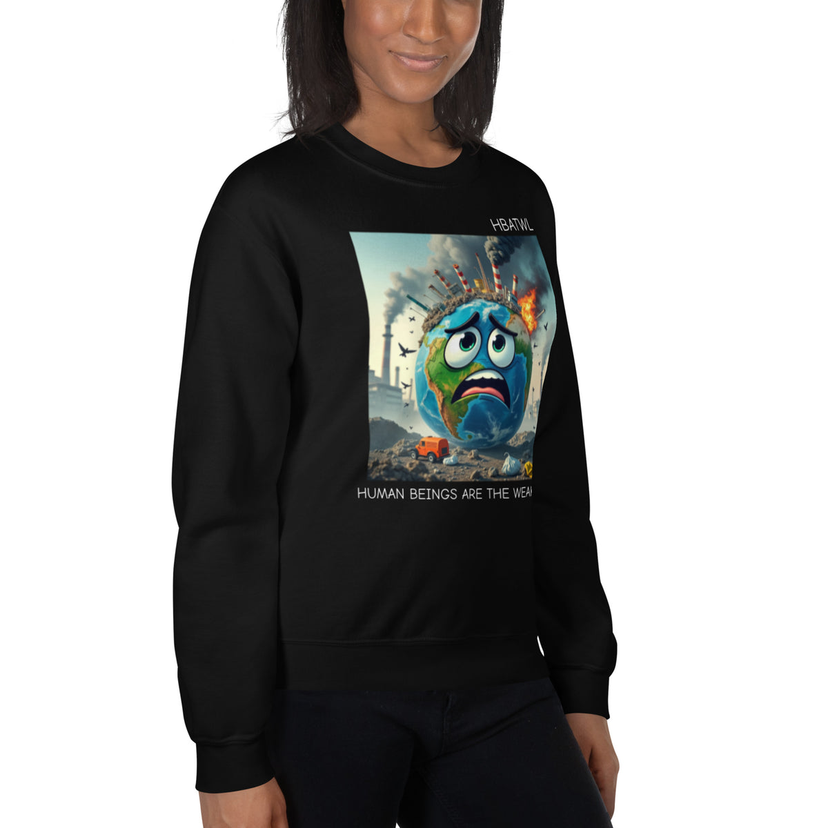 Model is wearing right front facing graphic sweatshirt in color black featuring an animated earth with facial expression of concern over being negatively effected by human pollution. Bold statement on the sweatshirt reads, 'Human Beings Are The Weakest link.', in white print. From What Was Said (Statement Apparel + More). mockup