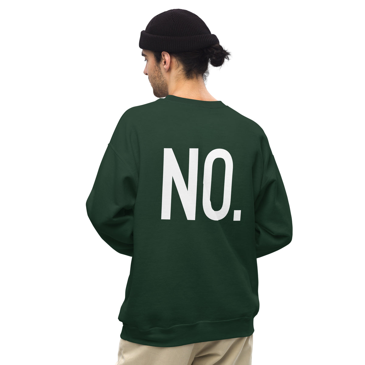 Model is wearing back facing graphic sweatshirt in color forest green, featuring the statement 'NO.' in bold white print, from What Was Said (Statement Apparel + More). 