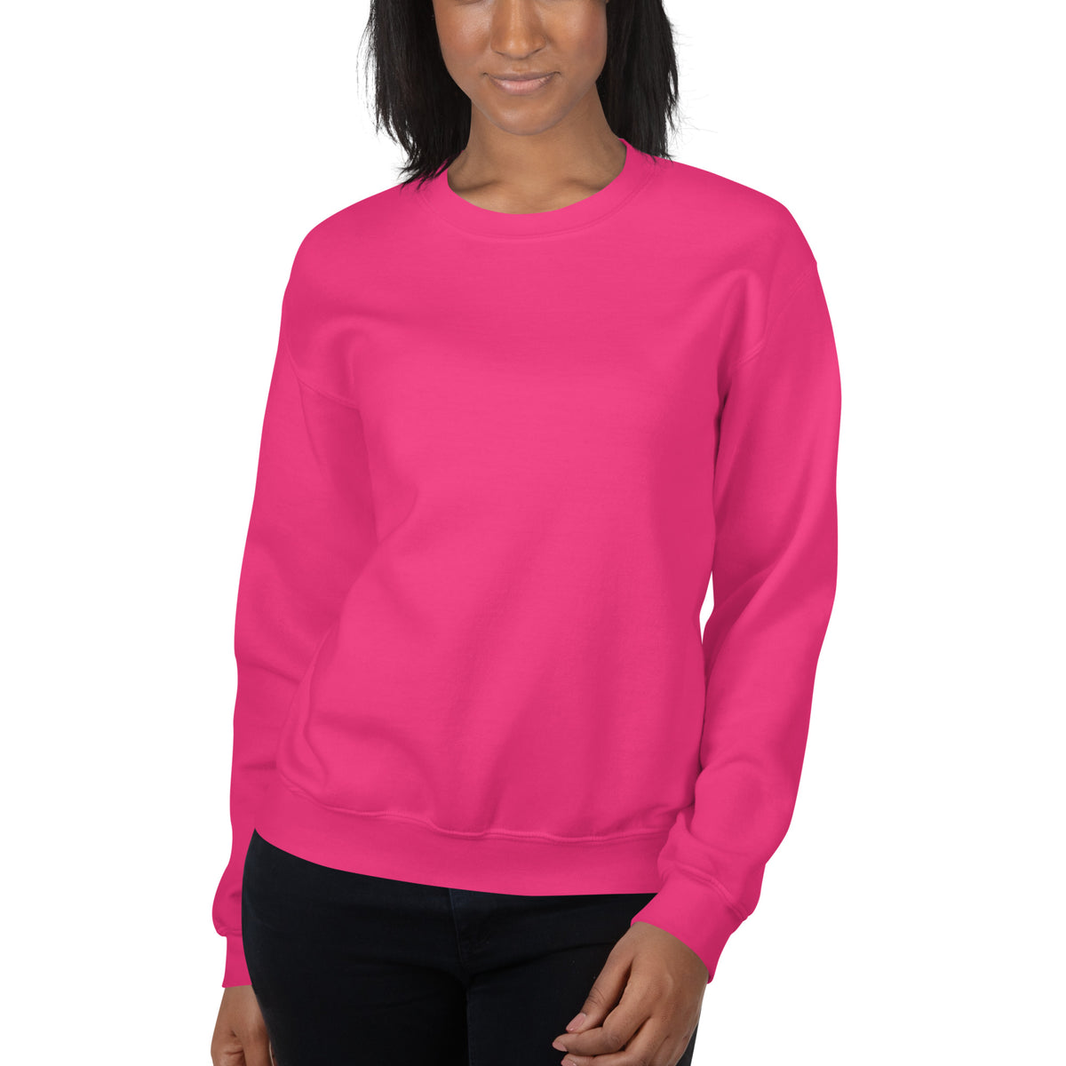 Model wearing front facing graphic sweatshirt in color heliconia pink, from What Was Said (Statement Apparel + More). 