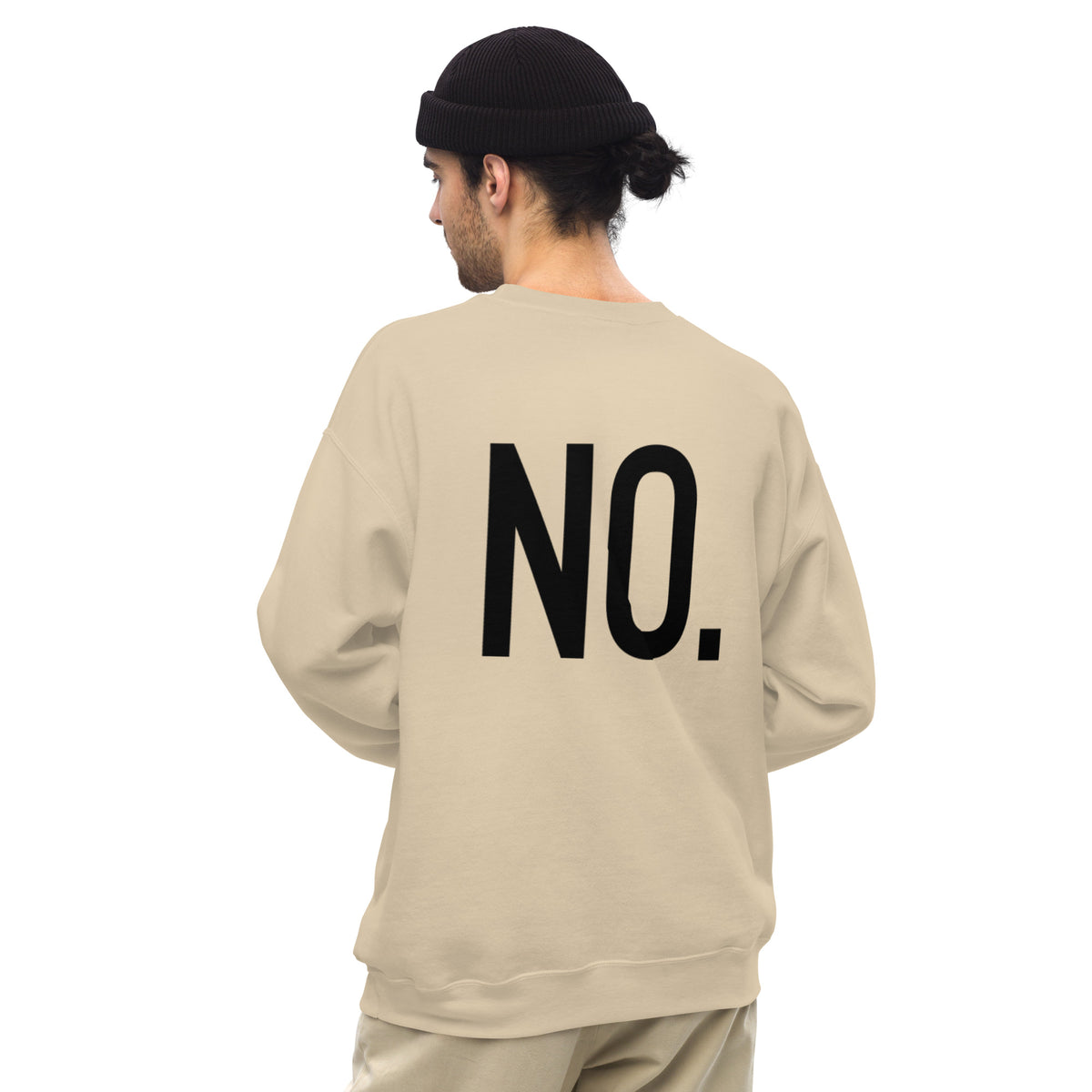 Model wearing back facing graphic sweatshirt in color sand, featuring the statement 'NO.' in bold black print. from What Was Said (Statement Apparel + More). 
