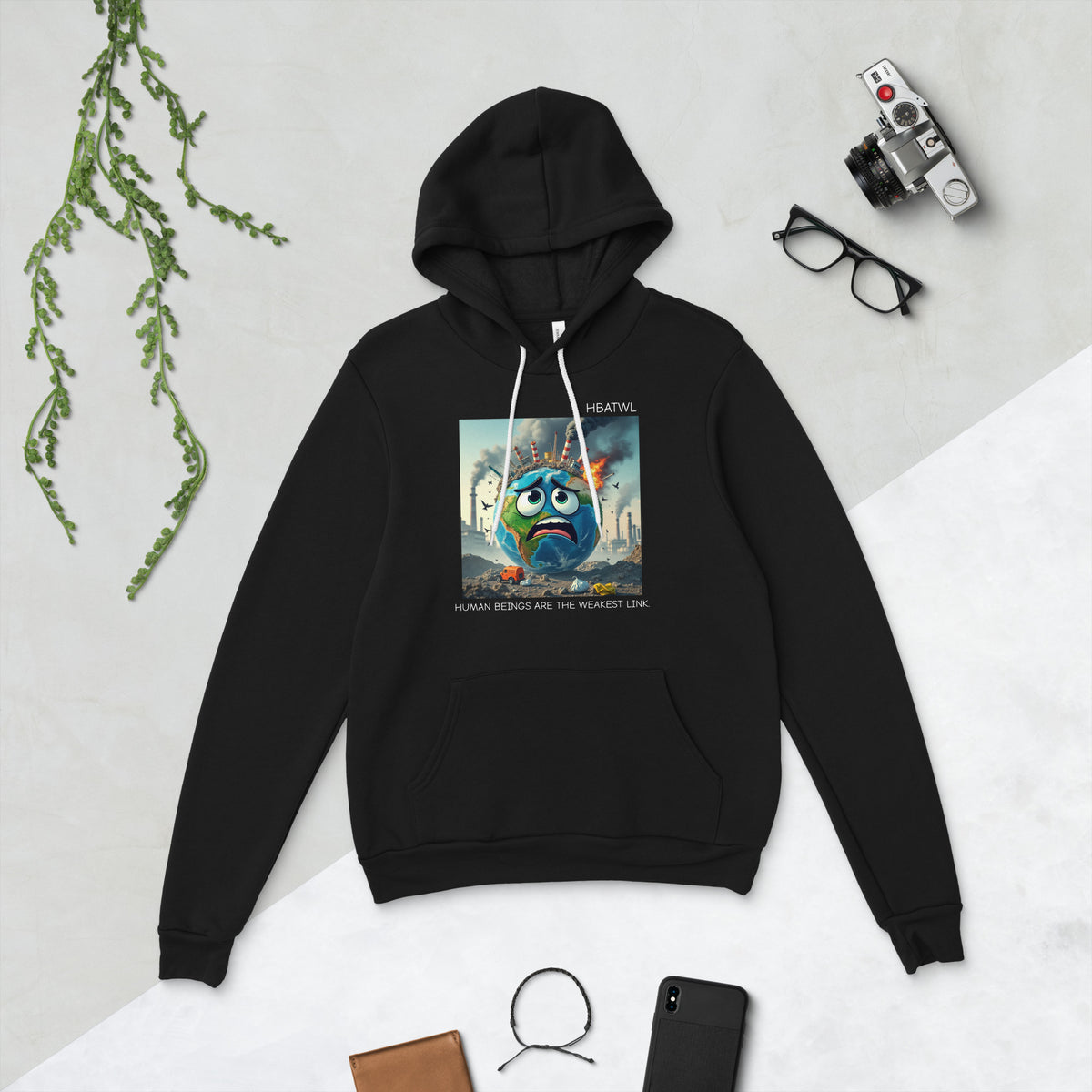 Front facing graphic hoodie in color black featuring an animated earth with facial expression of concern over being negatively effected by human pollution. Bold statement on the hoodie reads, 'Human Beings Are The Weakest link.', in white print. From What Was Said (Statement Apparel + More). mockup