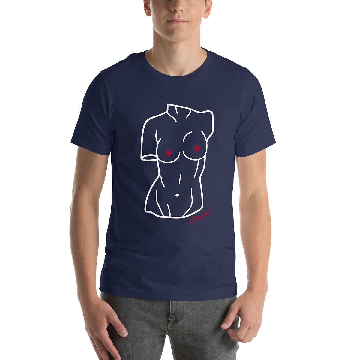 Model is wearing front-facing graphic T-shirt in color navy blue, featuring a woman's bust sculpture outlined in white with red heart shaped nipples, and the word 'Amour' in red print, from What Was Said (Statement Apparel + More). 