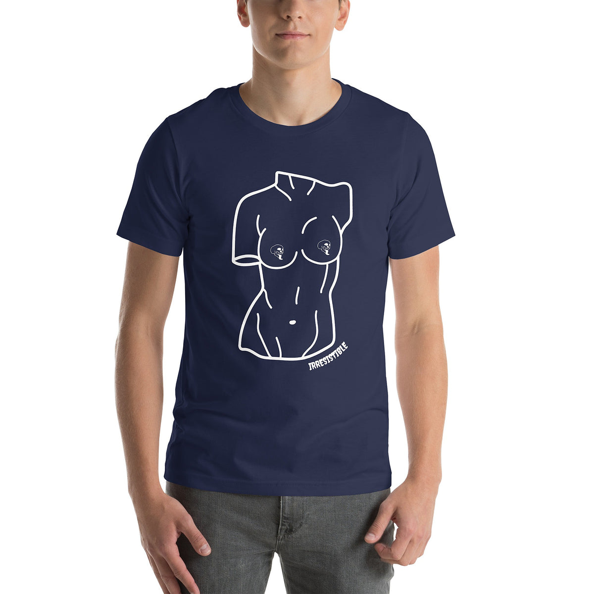 Model is wearing front-facing graphic T-shirt in color navy blue, featuring a woman's bust sculpture outlined in white with skull shaped nipples, and the word 'IRRESISTIBLE' in white print, from What Was Said (Statement Apparel + More). 