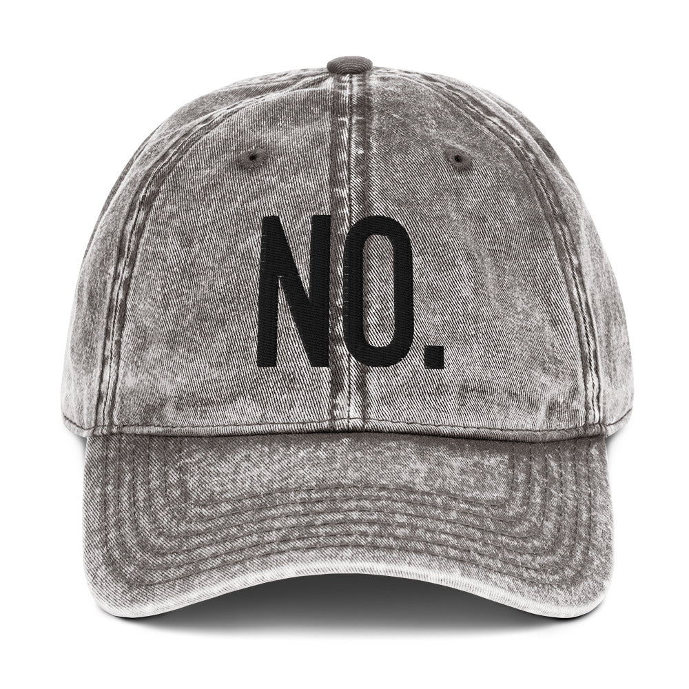 Front facing vintage graphic cotton twill cap in color charcoal grey wash, featuring the statement 'NO.' in bold black embroidery. From What Was Said (Statement Apparel + More).