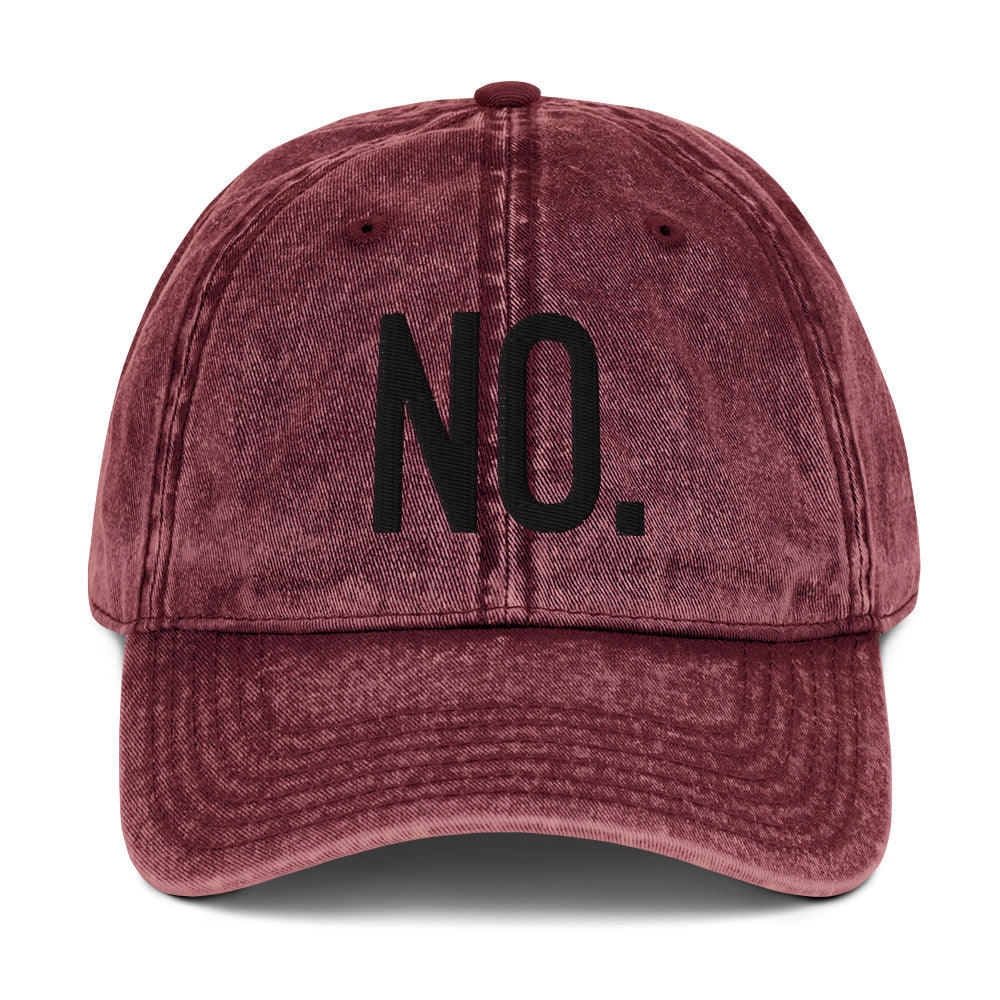 Front facing vintage graphic cotton twill cap in color maroon red wash, featuring the statement 'NO.' in bold black embroidery. From What Was Said (Statement Apparel + More).