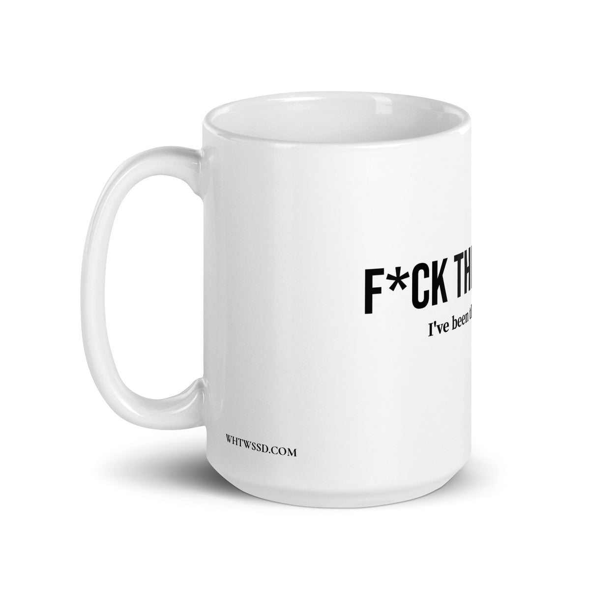 Left side facing graphic 15 oz mug in color white featuring the brands website, WHTWSSD.COM on the left side, and the statement, 'F*UCK THE PROCESS, I've been through enough,' on the front of the mug in bold black print. From What Was Said (Statement Apparel + More). 
