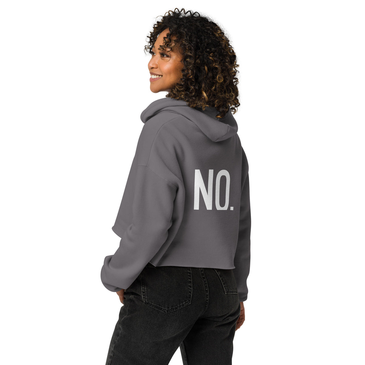 Model is wearing back facing pullover graphic cropped hoodie in color storm grey, featuring the statement 'NO.' in bold white print. From What Was Said (Statement Apparel + More). 